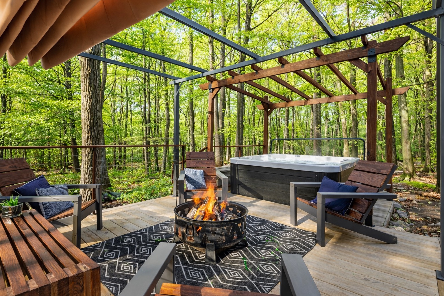Private hot tub—perfect for relaxing under the stars in a peaceful forest setting.